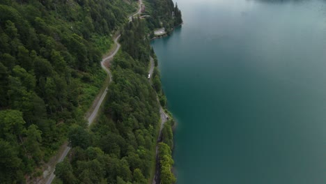 swiss nature dense forest canopy klöntalersee lake switzerland europe, aerial