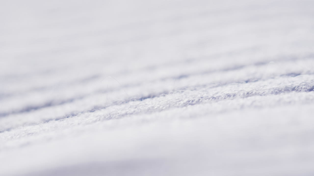 micro vídeo de primer plano de tela blanca de lana con espacio para copiar