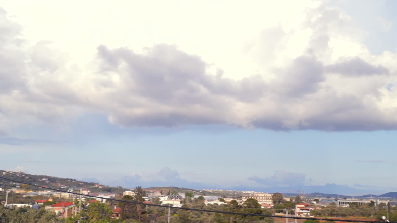 Wide panoramic view of landscape at Markopoulo , East Attica, Greece. Cloud formations in the sky over El.Venizelos international airport of Greece 4k