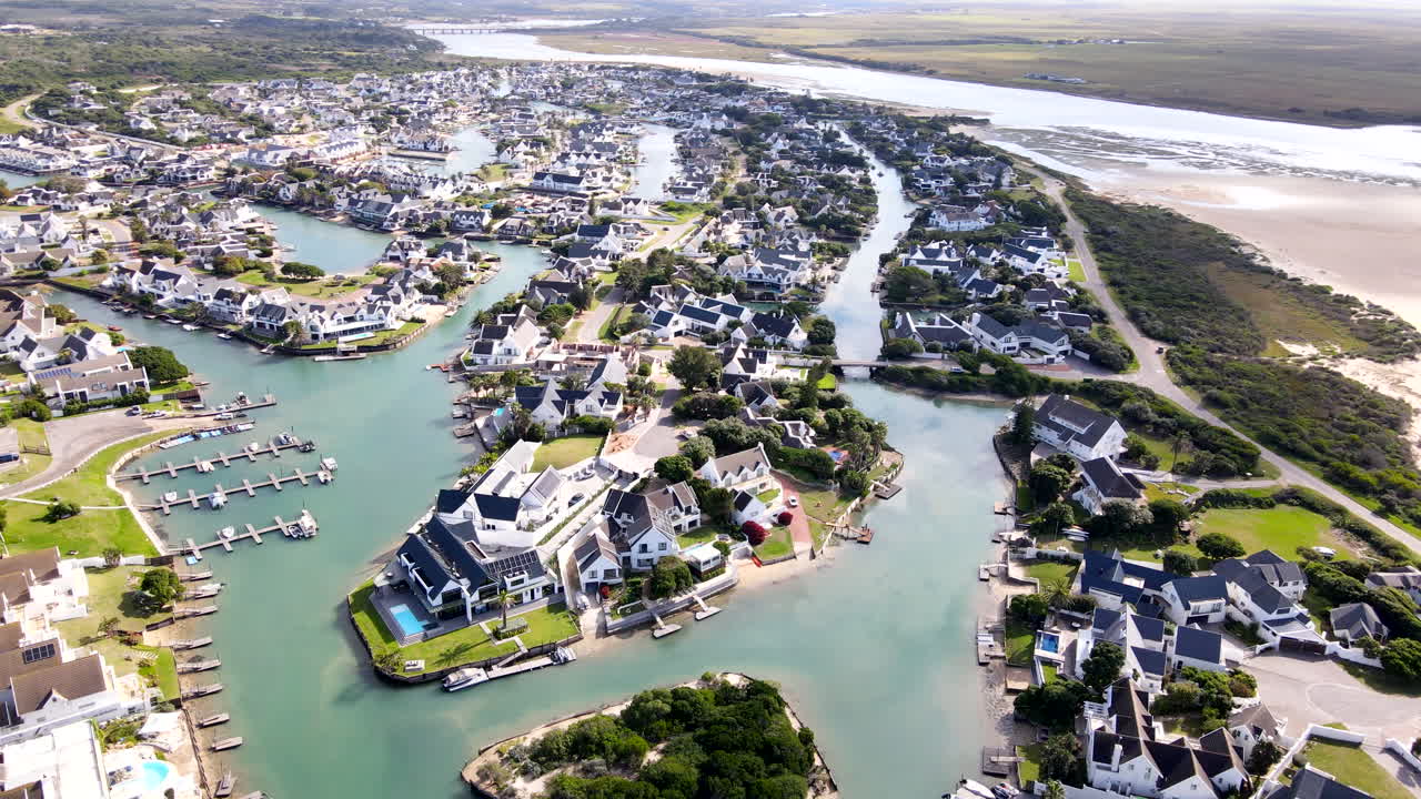 Marina glades canals and properties of St Francis Bay on Kromme River. Drone pan