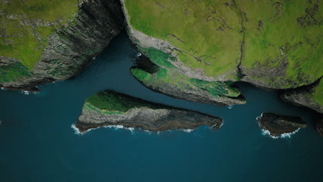Aerial View of Rugged Green Cliffs and Ocean