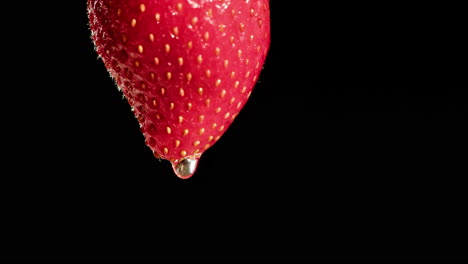 close-up of a strawberry with water droplets