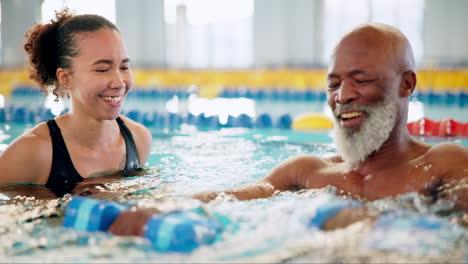 people exercising in swimming pool