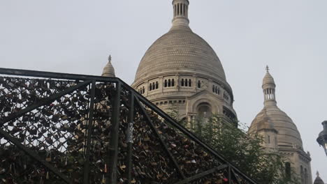 sacre-coeur basilica in paris with love locks