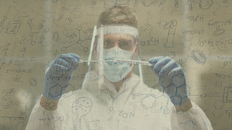 Animazione di elaborazione dati medici sopra un uomo caucasico con mascherina e tuta protettiva che tiene in mano dei tamponi.