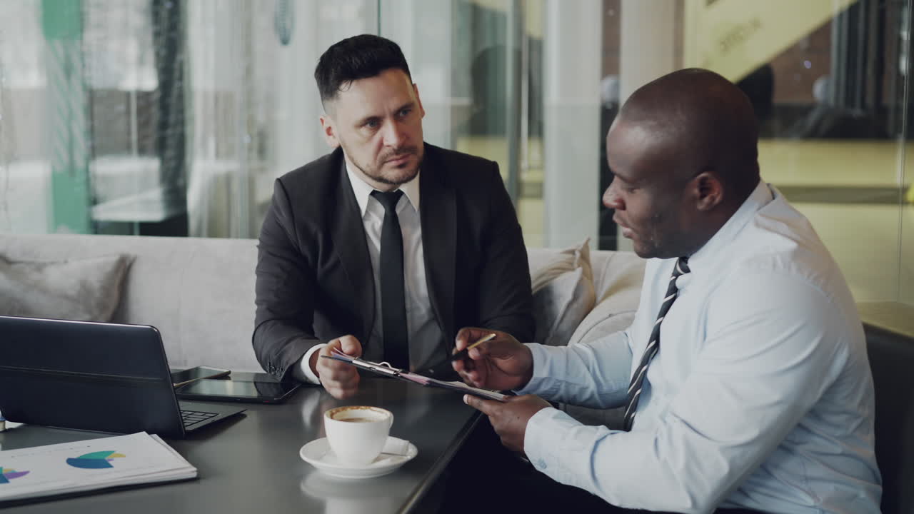 Business Meeting in Coffee Shop