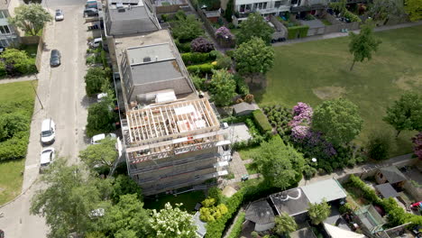 aerial overview of wooden frame of roof structure under construction