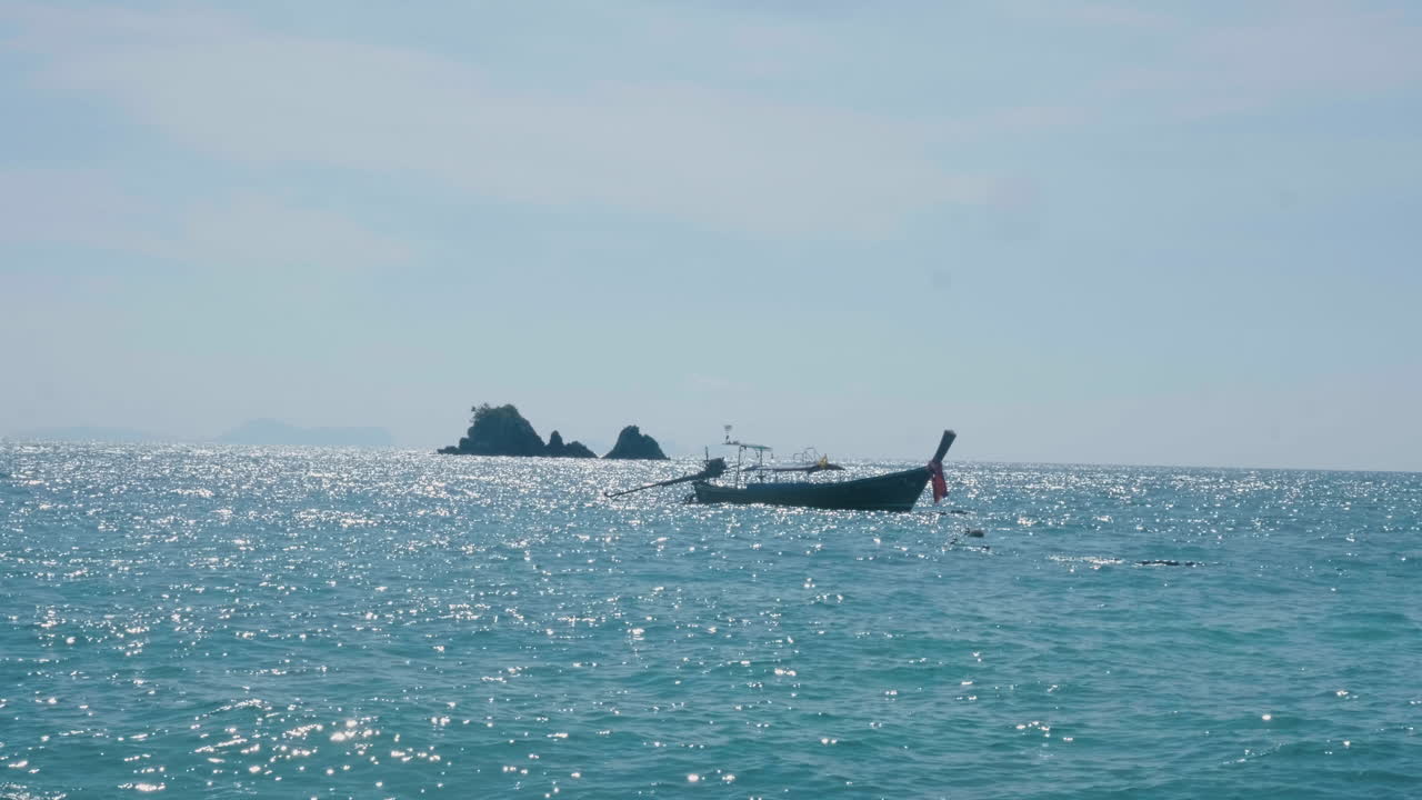 Tranquil Seascape with Longtail Boat and Islands