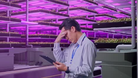 stressed employee in a vertical farm