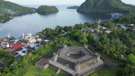 orbital drone view of banda neira fort and harbour bay