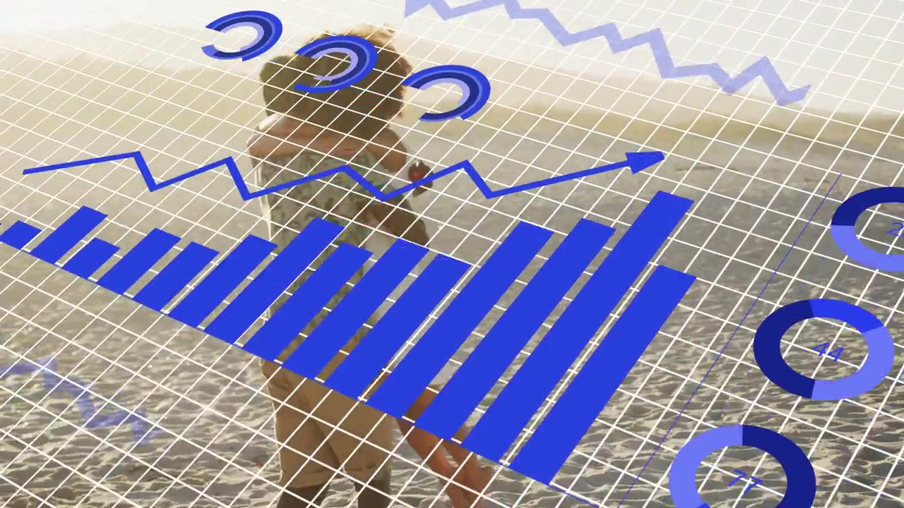 Woman walking along sandy shore, movement causing analytics grid and blue charts syncing to steps