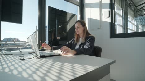 car service manager working at desk in office