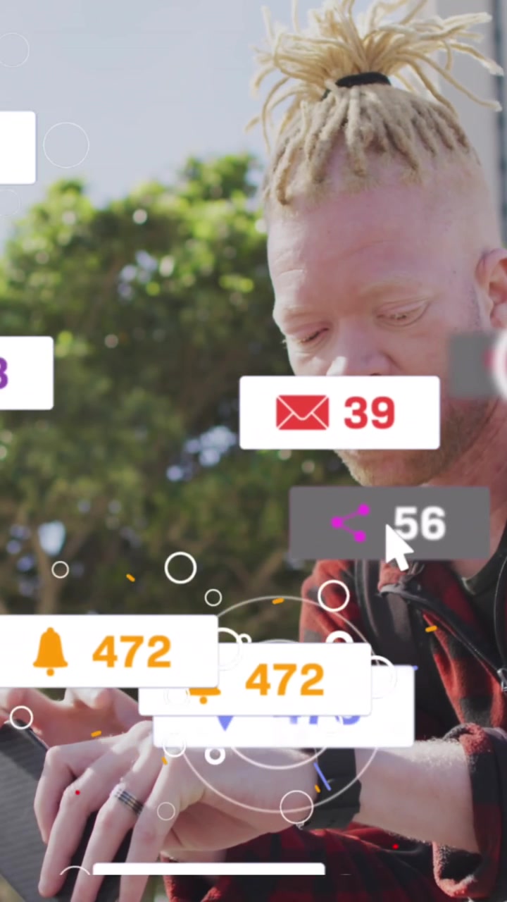 Animation of social media icons over african american albino man using smartwatch in street