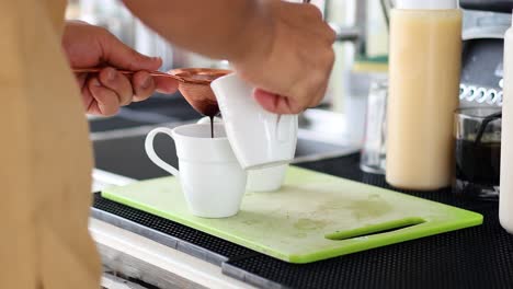 sequence of making coffee with milk and cocoa