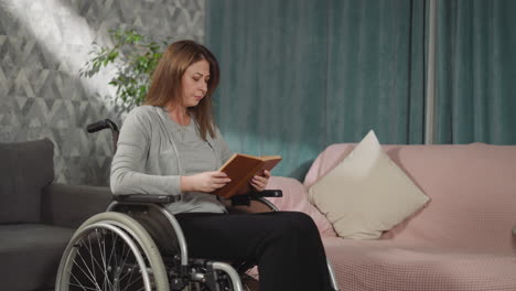 Woman-reads-book-while-daughter-bringing-glass-of-water