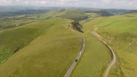 cadair viewpoint in wales with cars driving drone video tilting down