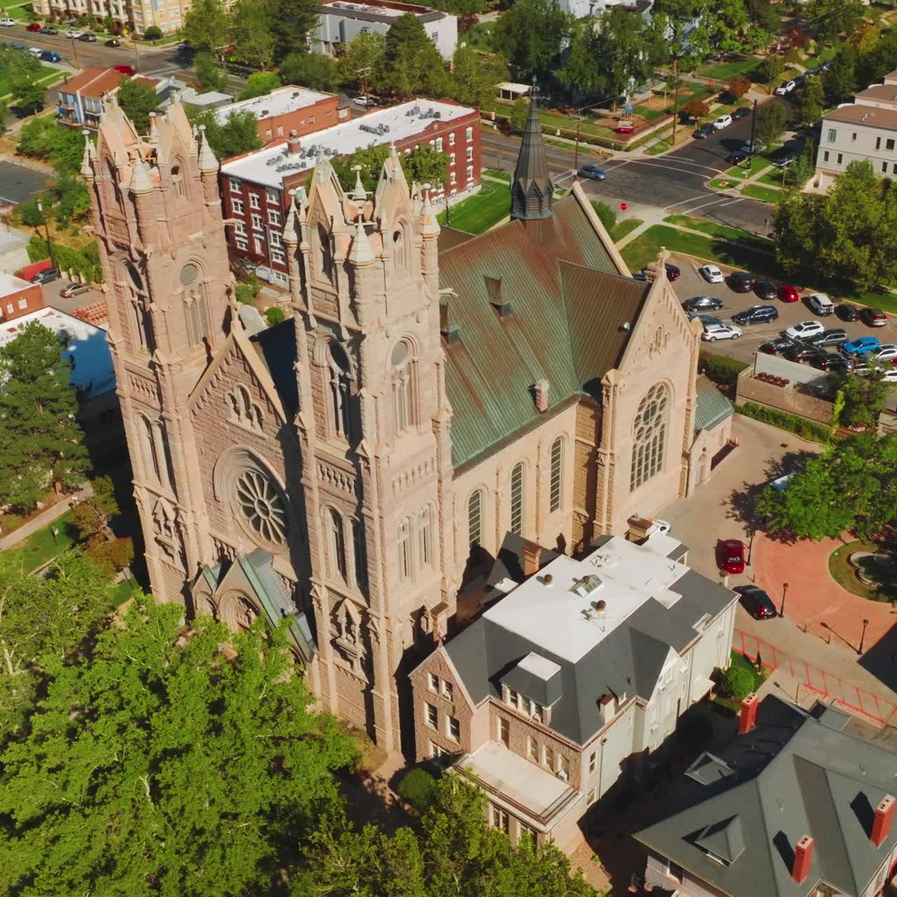 Flying around the gorgeous historic landmark in salt Lake City, Utah, USA. Gothic building of Cathedral of Madeleine from aerial perspective