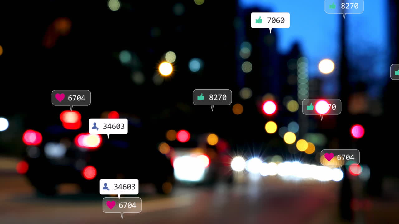 Animation of social media icons and numbers over out of focus city lights