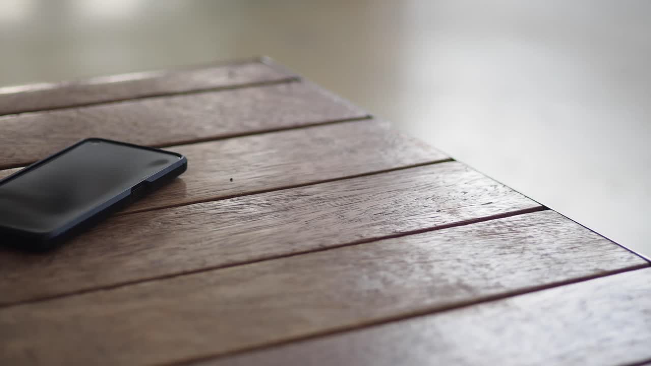 Smartphone on a Wooden Table