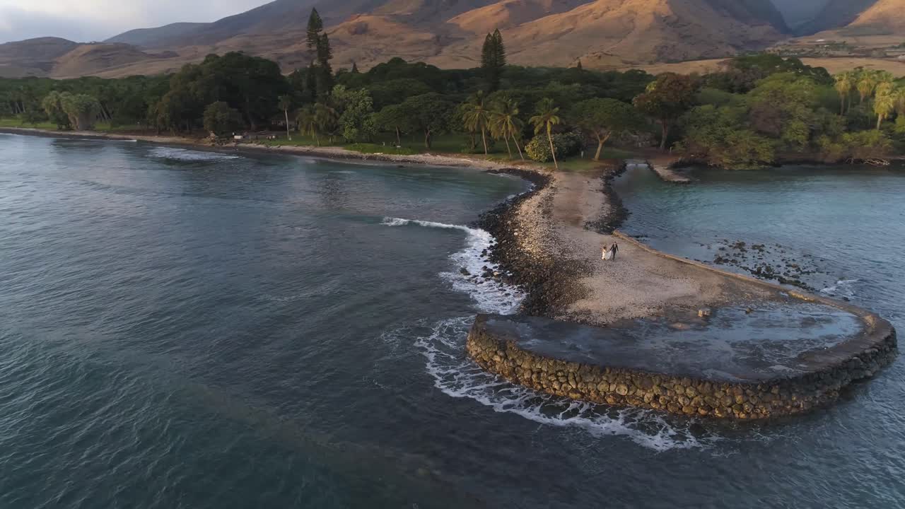 STUNNING! Wedding Couple Walk Out on to Pier Ocean Drone Shot 2