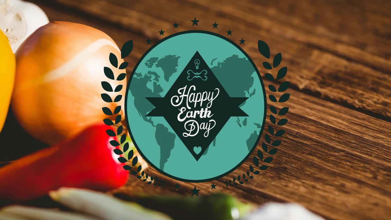Animación de texto de feliz día de la Tierra sobre vegetales