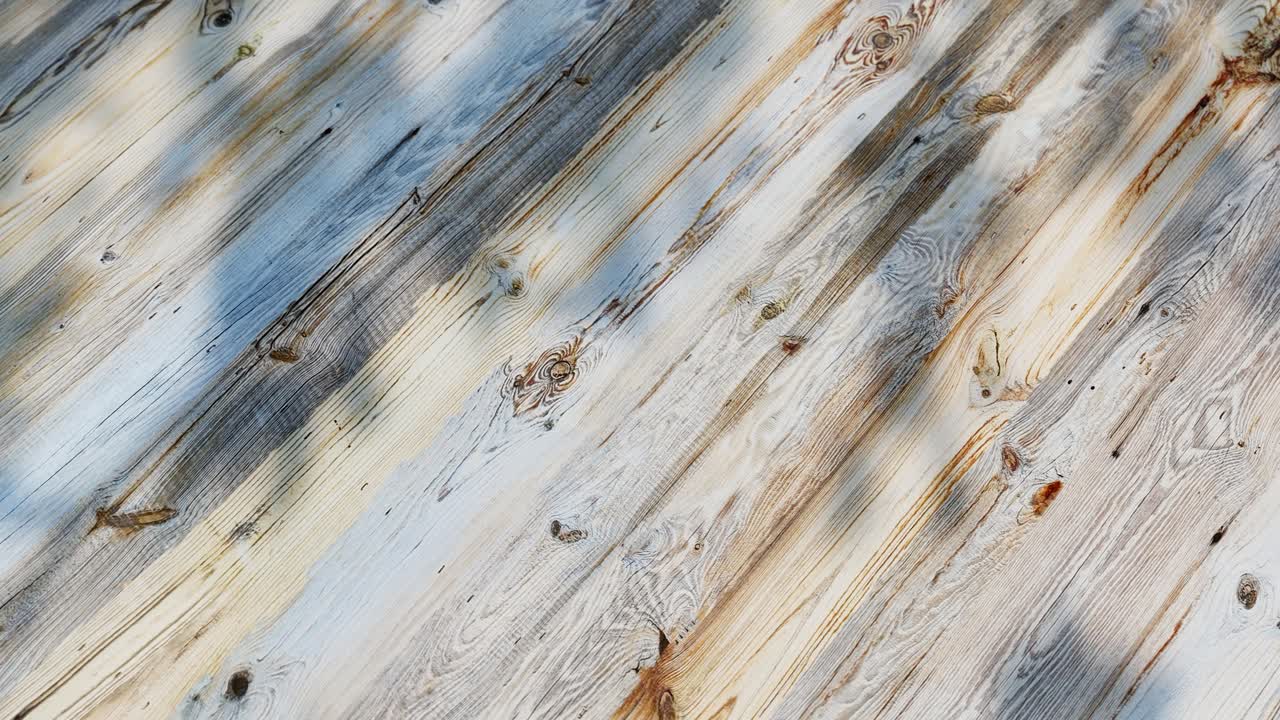 Moving Shadows on a Weathered Wooden Surface