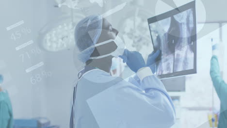 animation of infographic interface, african american doctor anaylzing x-ray report at operation room
