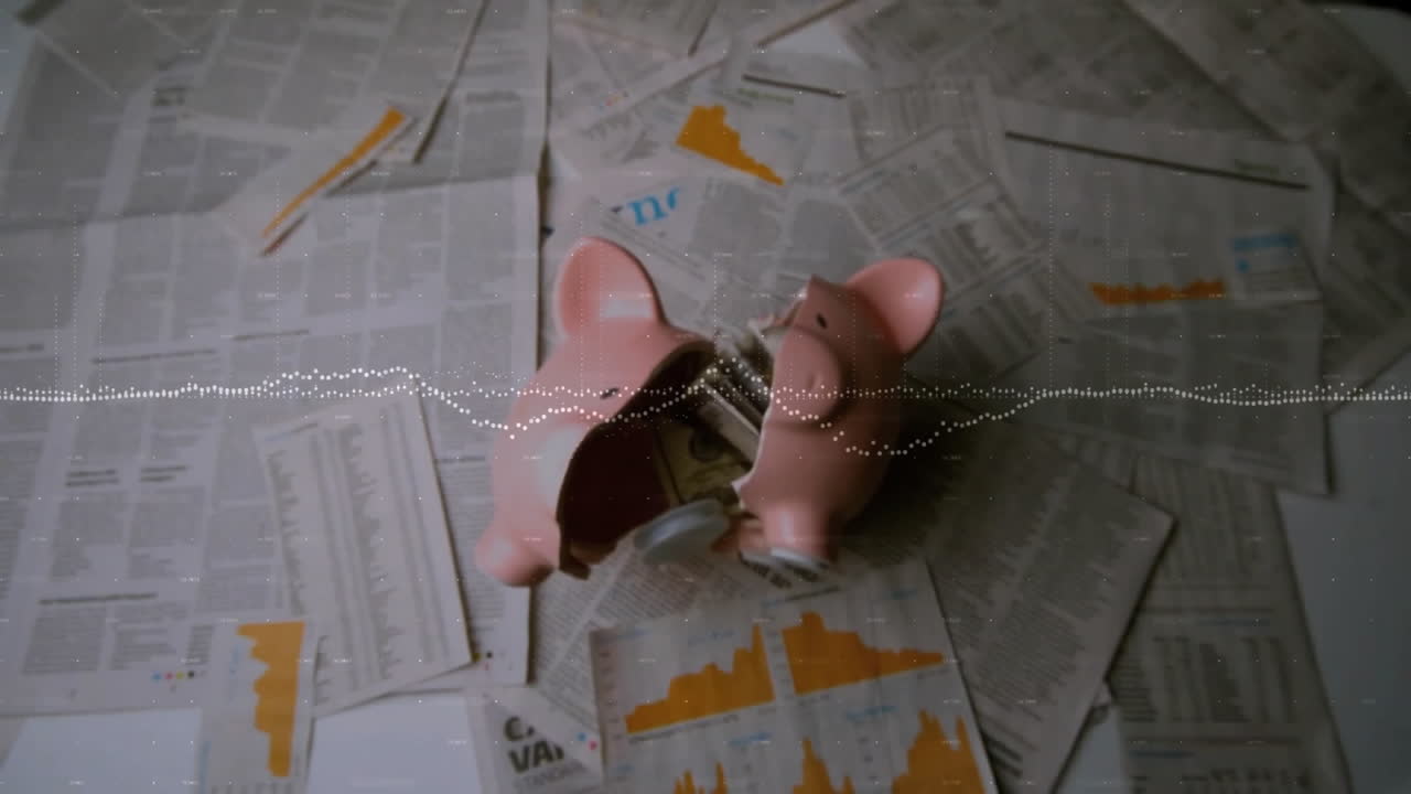 금융 뉴스 애니메이션 위에 동전이 어져있는 깨진 돼지 은행