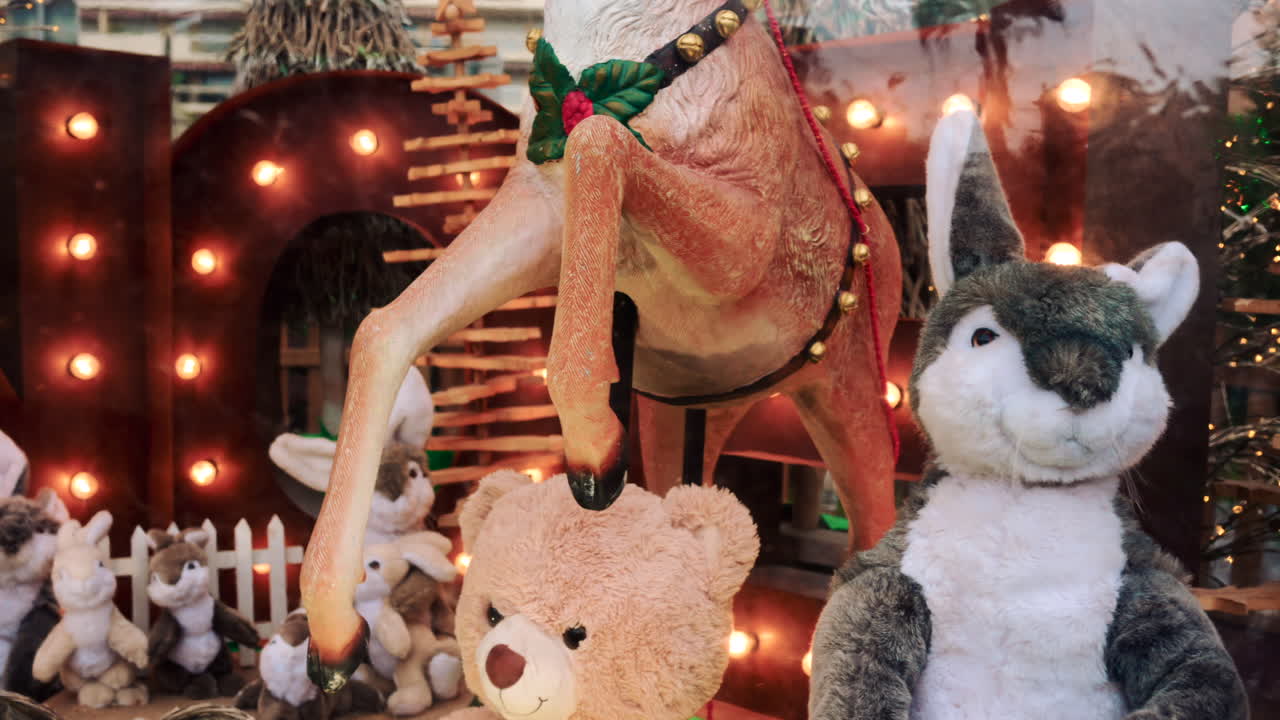 A closer view of a plush rabbit toy in shop window display