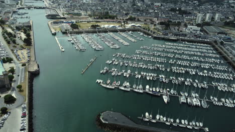 aerial view of a marina and cityscape