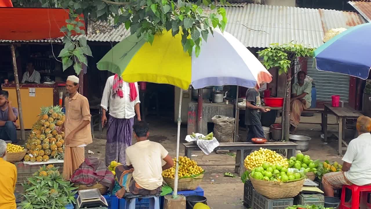 Vendors Selling Meat and Fruits at a Local Market in Narsingdi, Bangladesh - Pan Right Shot