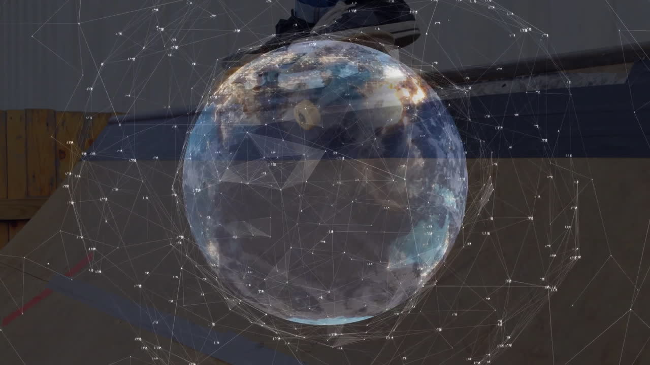 Holographic Earth globe rotating above skateboard and sneaker, with network lines and nodes