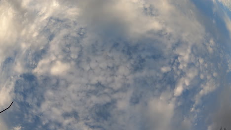 Time-lapse-footage-capturing-the-mesmerizing-transformation-of-clouds-during-a-breathtaking-sunset