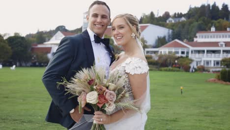 Bride-and-groom-smile-happily