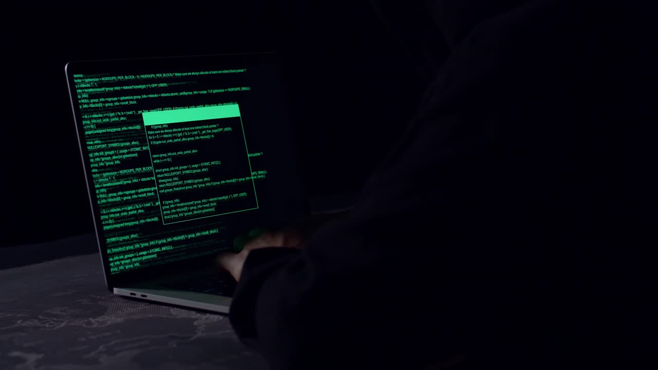Hacker Using Laptop Computer Hacking