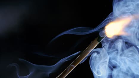 Burning-matchstick-close-up-on-a-dark-background.-Shot-on-super-slow-motion-camera-1000-fps.