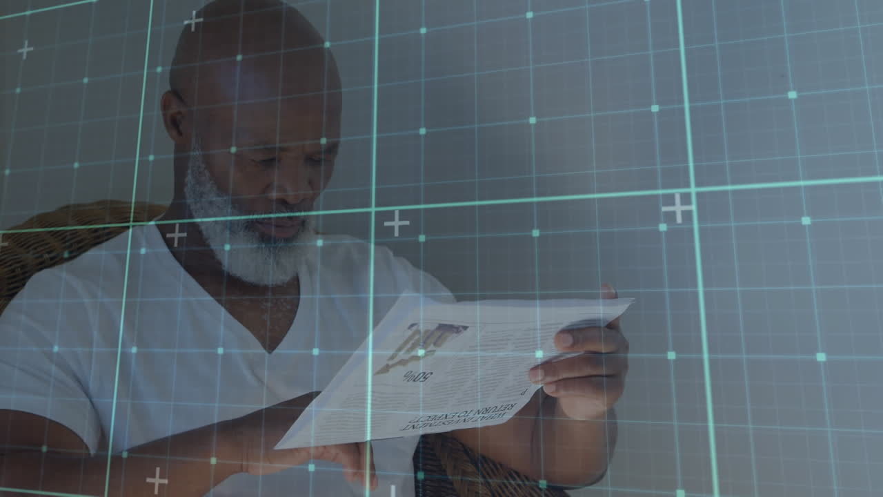 Animation of shapes moving over senior african american man reading