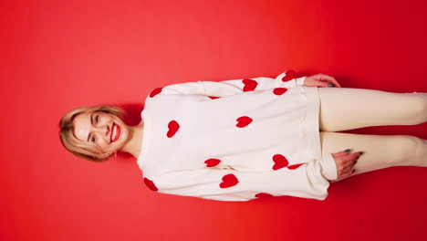 woman in heart-patterned sweater