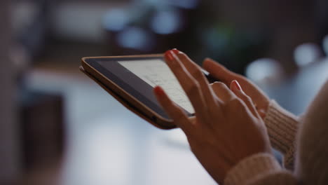 Close-up-of-womans-hands-using-digital-tablet-computer-technology