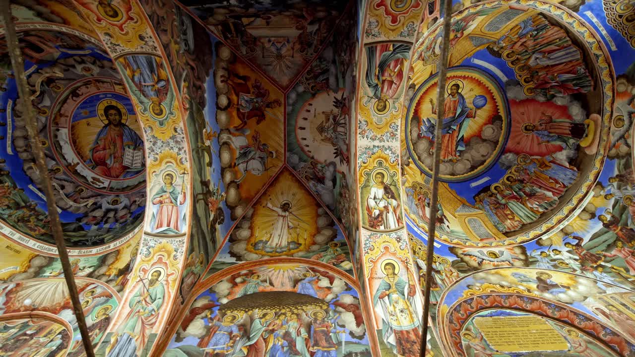 Decorated ceiling frescoes in Rila Monastery chapel, Bulgaria, featuring intricate patterns and medieval Orthodox art, showcasing sacred and historic craftsmanship