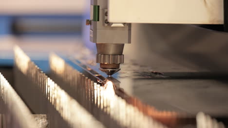 CNC-Laser-cutting-of-metal,-modern-industrial-technology.