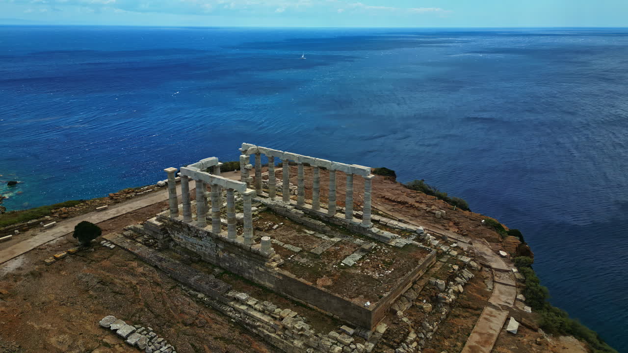 The ancient Temple of Poseidon at Sounion overlooking the Aegean Sea