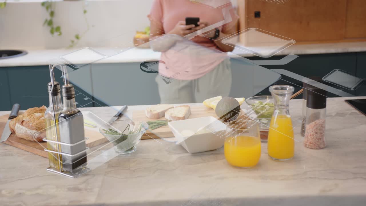 Woman placing plate down, using phone while graphics sliding over counter, marking cooking items