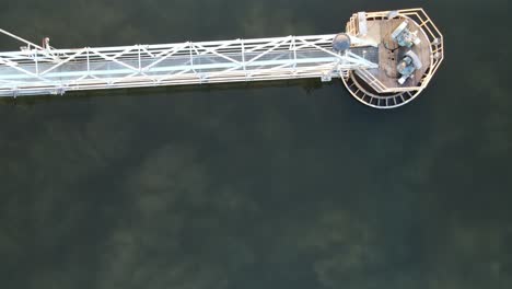 Aerial-top-down-Close-up-view-of-the-clarifier-with-the-sludge-visible,-drone,-4k