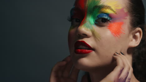 close up portrait beautiful woman wearing colorful face paint exotic multicolored body art sensual female enjoying creative expression