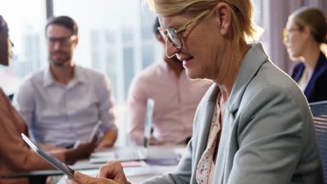 businesswoman using digital tablet