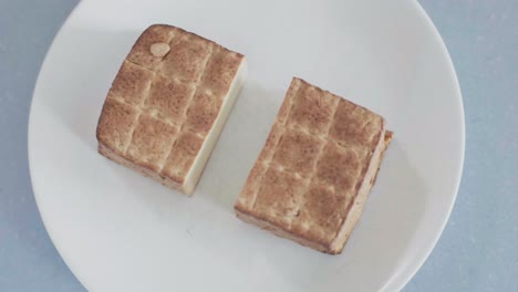 smoked tofu sliced into two blocks