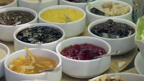 assortment of sweet spreads and preserves