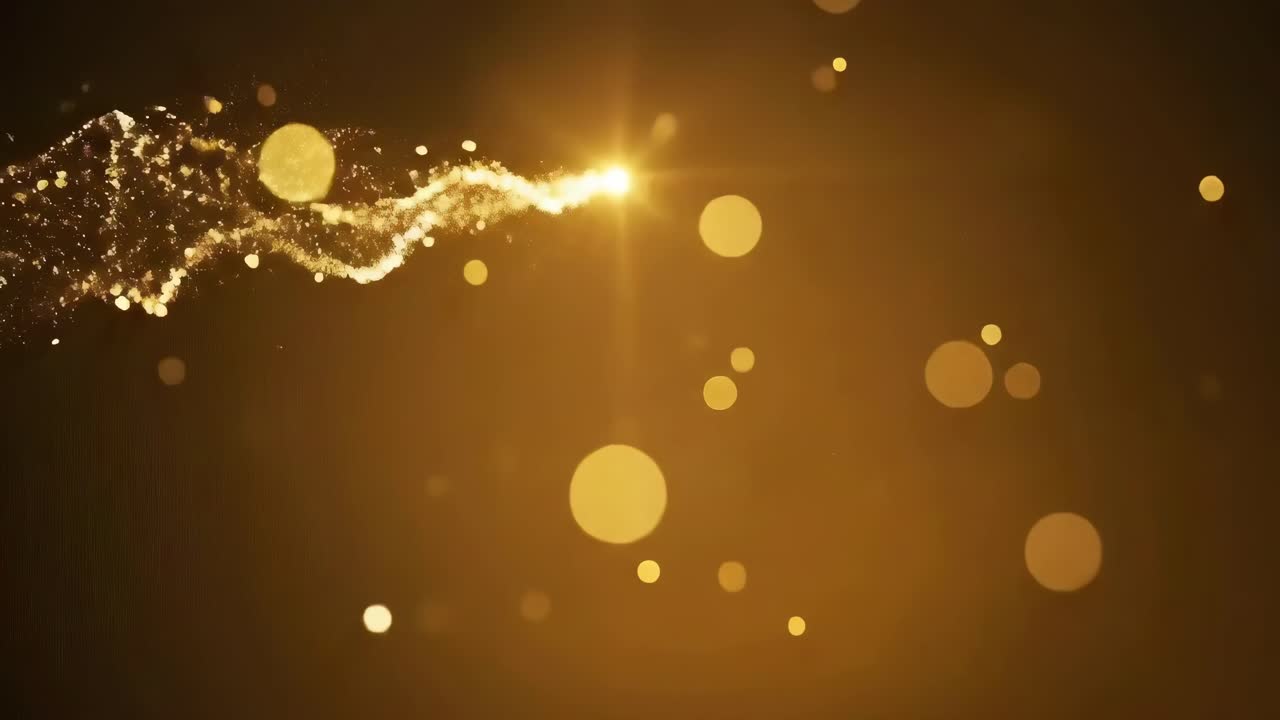 Golden particles swirl in a dynamic video, captured from a side angle, creating a magical effect
