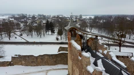 ruins of ancient livonian order's stone medieval castle latvia aerial drone top shot from above